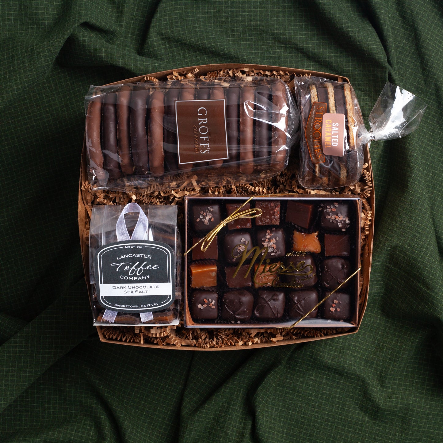 Lancaster Gift Box - Chocolate Classics filled with chocolate caramels, Chocolate Toffee, chocolate-covered pretzels and stroopies. 